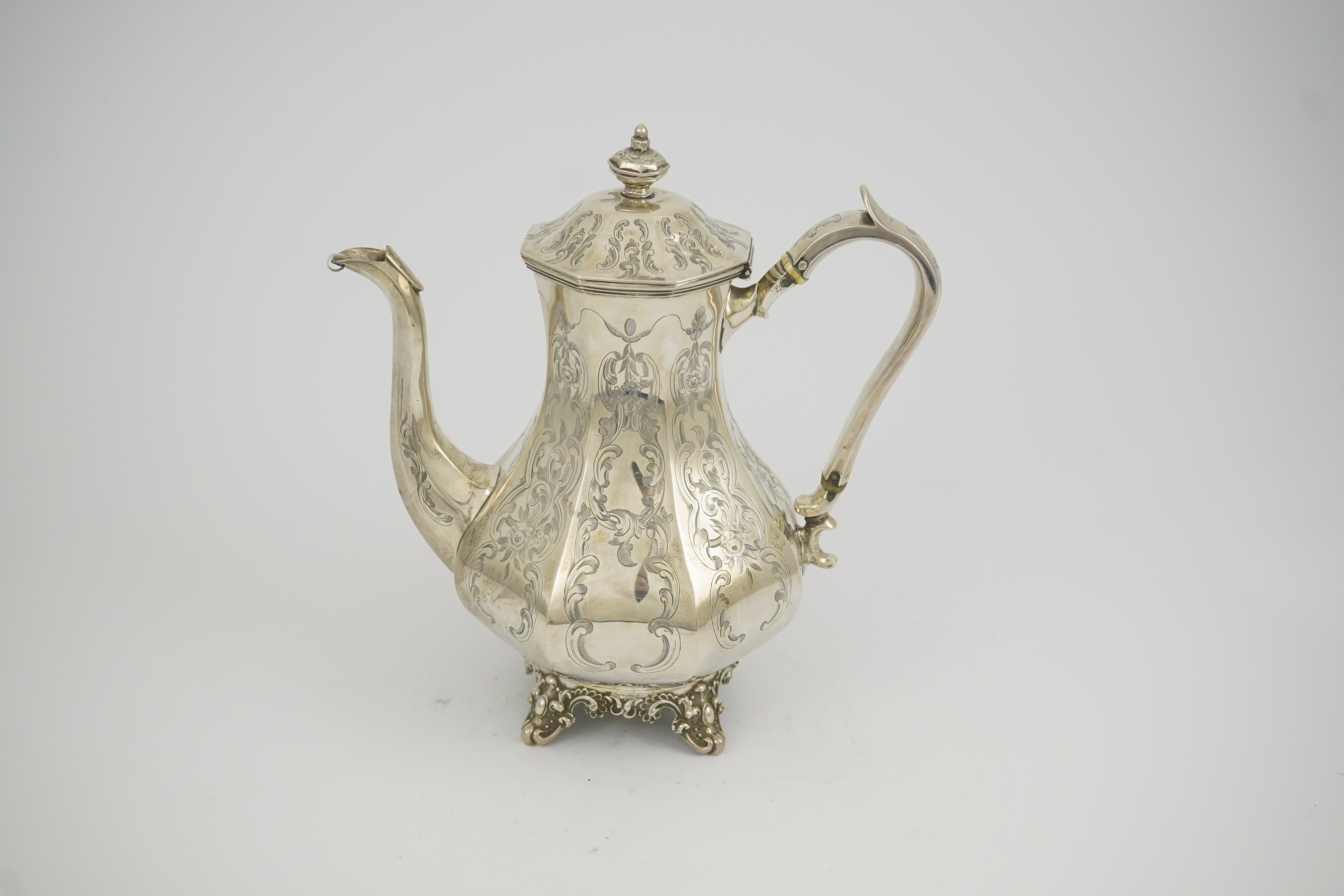 A Victorian engraved silver coffee pot, by John Welby